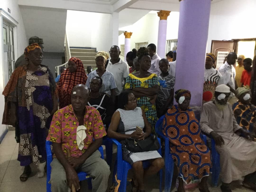 Group of patients sitting and standing together